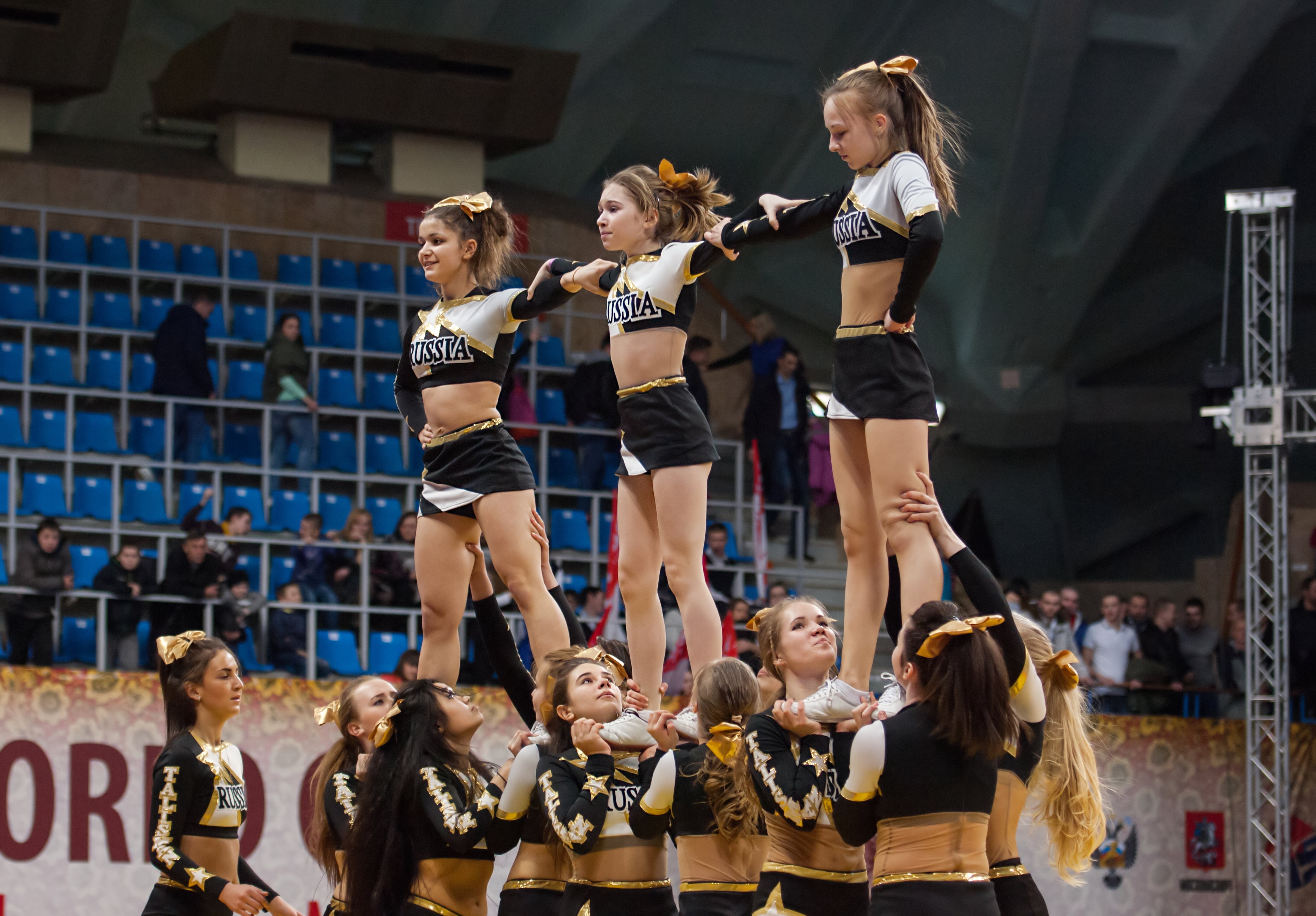 Competitive cheer team performing routine at a competition