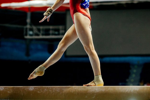 Girl walking on a balance beam-2 Girl walking on a balance beam